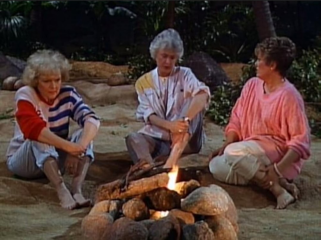 The girls stranded on a desert island